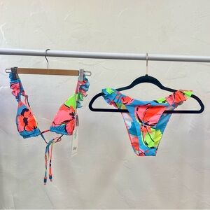 Medium Maaji women’s reversible bikini top and bottom.